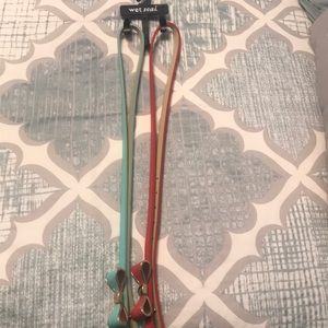 Wet seal thin belts with bows